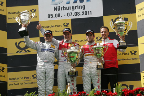 på podiet Bruno Spengler, Mattias Ekström og Mike Rockenfeller.